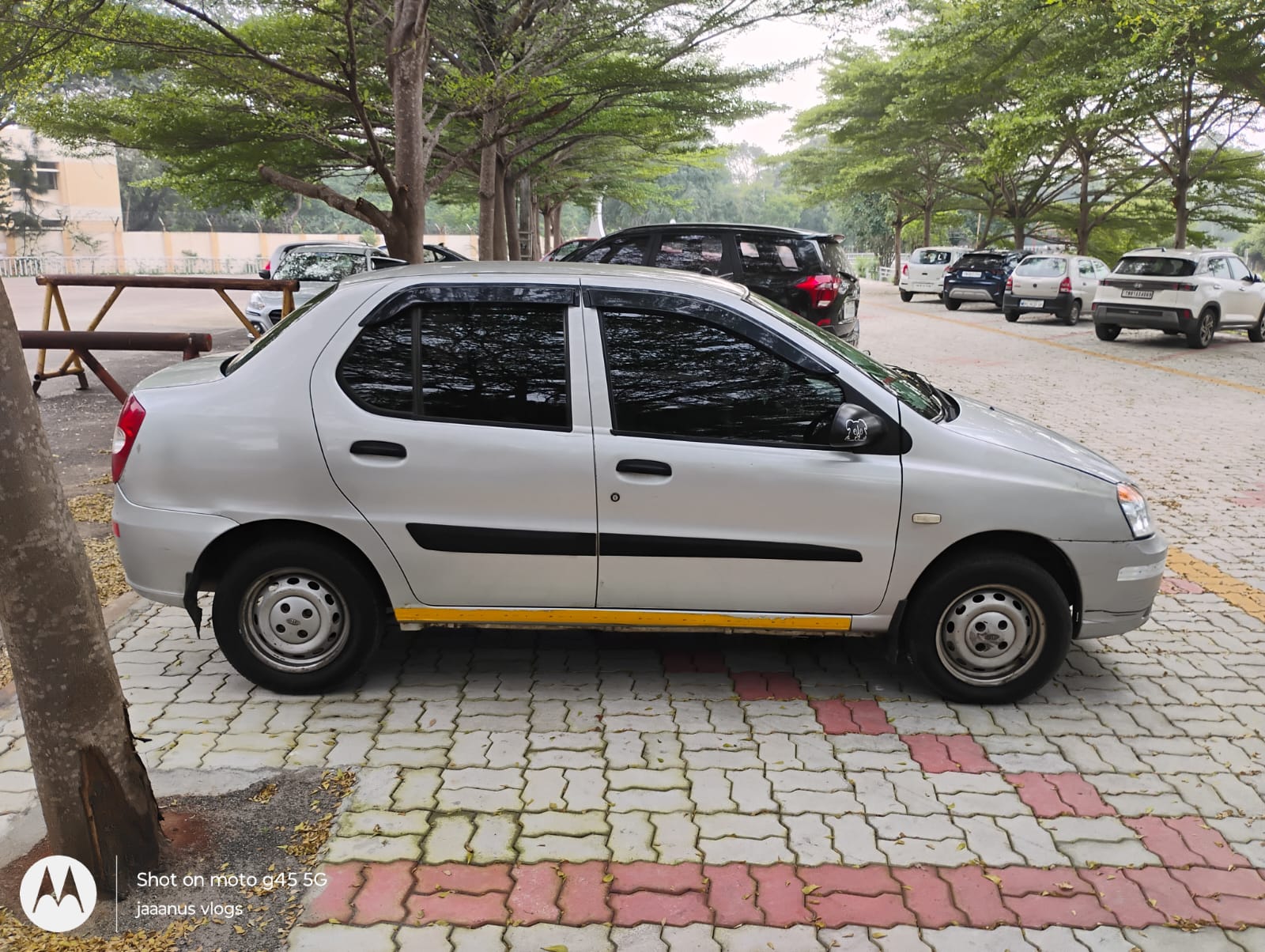 Alpha Cabs Trichy — sedan side profile